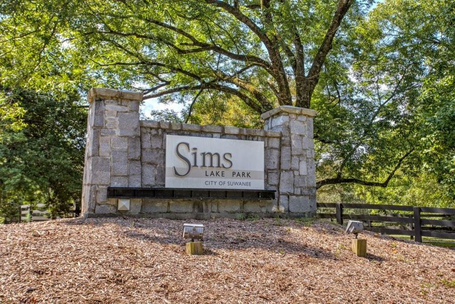 Front exterior of a new home in , Suwanee, GA, highlighting curb appeal (Image 1).