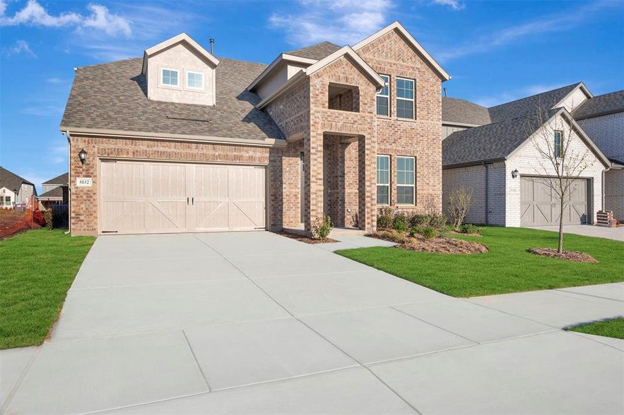 Front exterior of a new home in Lily Creek at Sutton Fields, Aubrey, TX, highlighting curb appeal (Image 22).