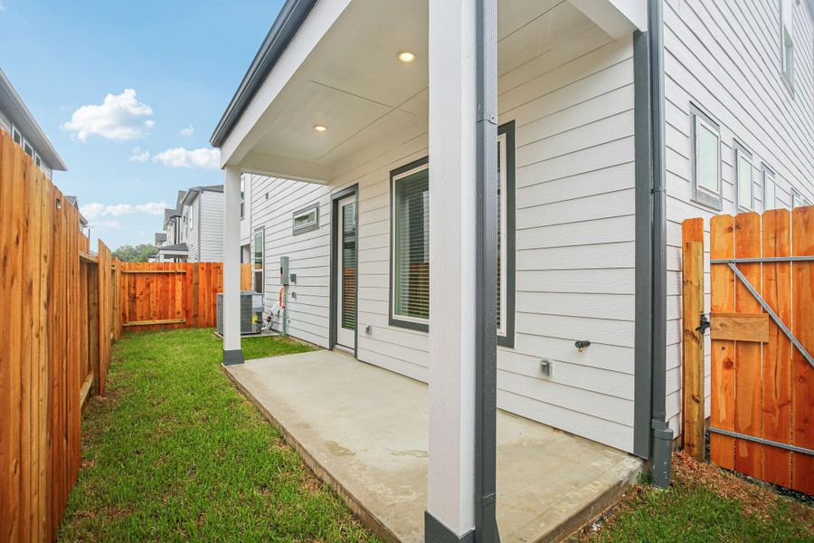 Front exterior of a new home in Spring Brook Village - Luxe Series, Houston, TX, highlighting curb appeal (Image 1). Front exterior of a new home in Spring Brook Village - Luxe Series, Houston, TX, highlighting curb appeal (Image 1).