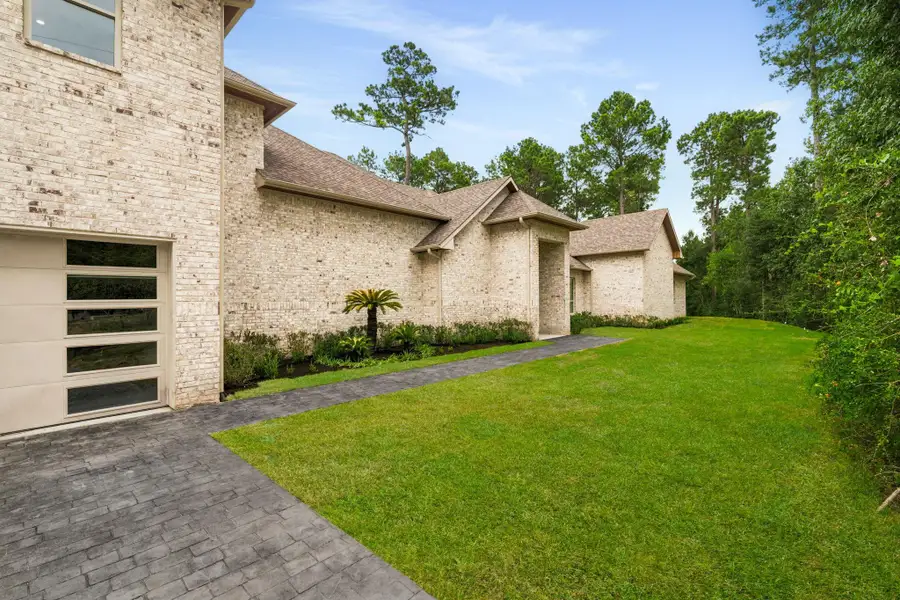 Exterior details and patio area of a home in , Tomball (Image 27).