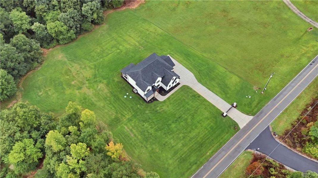 Front exterior of a new home in , Jefferson, GA, highlighting curb appeal (Image 33).