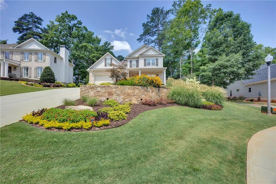 Front exterior of a new home in , Covington, GA, highlighting curb appeal (Image 2). Front exterior of a new home in , Covington, GA, highlighting curb appeal (Image 2).