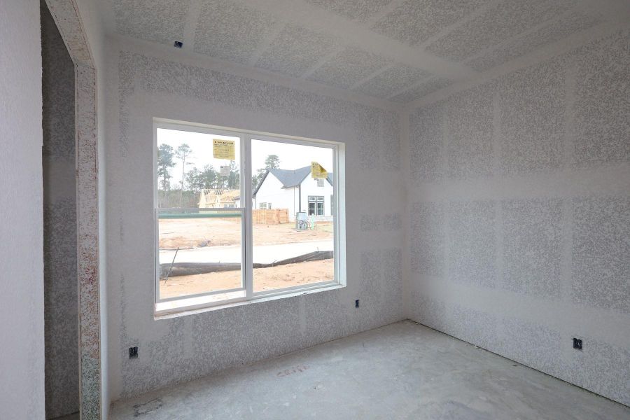 In-progress construction of a new home in Two Step Farm 42', Montgomery, TX (Image 9).