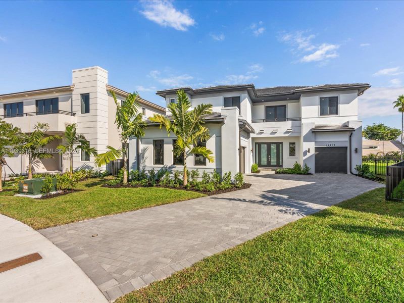 Front exterior of a new home in , Miami, FL, highlighting curb appeal (Image 26).