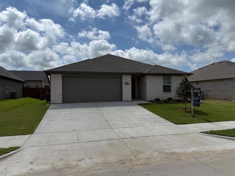 Front exterior of a new home in , Sherman, TX, highlighting curb appeal (Image 16).