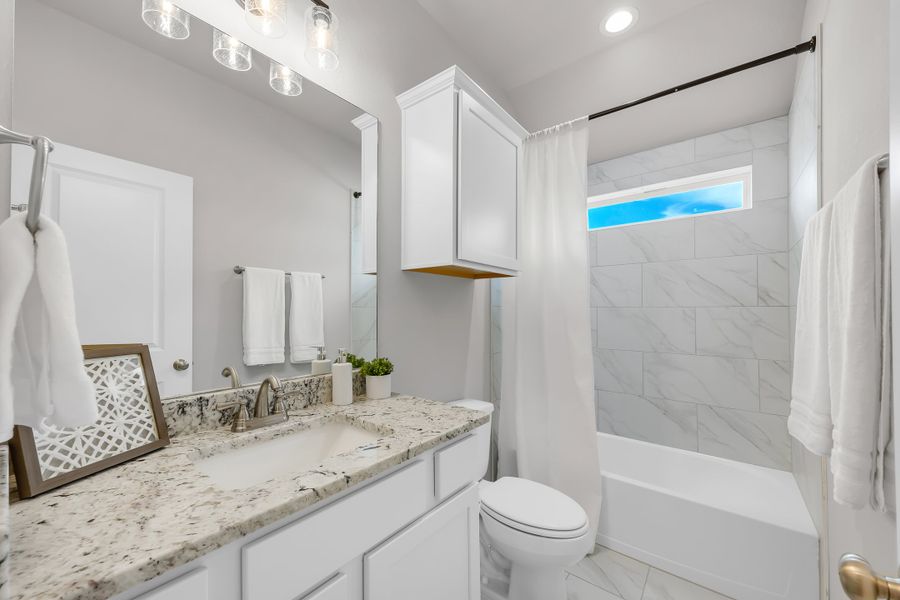 Representative furnished interior of a home built from the The Poppy by Avonley Homes in Rudder Pointe, Bryan (Image 10).