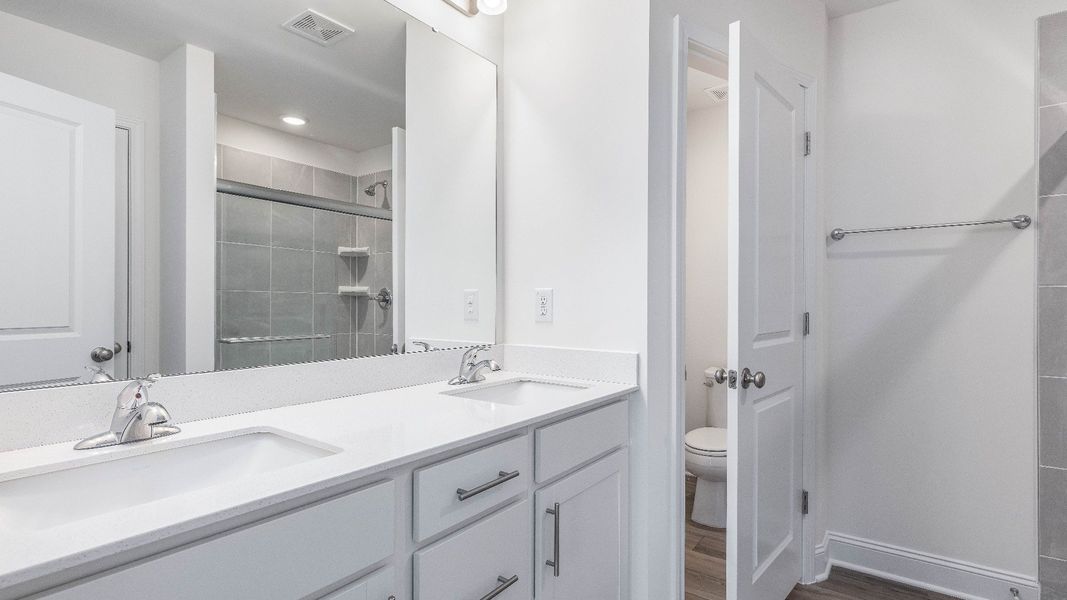 Furnished interior view inside a new home in Sidney Creek Townhomes, Zebulon (Image 17).