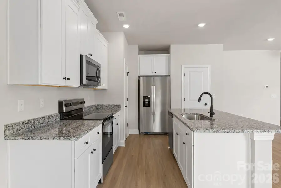 Furnished interior view inside a new home in Ascot Woods, Charlotte (Image 5).