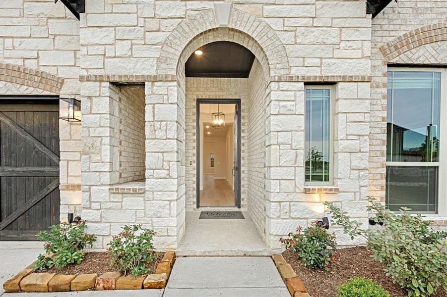 Front exterior of a new home in Sunrise at Garden Valley 60-79, Waxahachie, TX, highlighting curb appeal (Image 26).