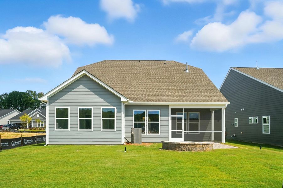 Front exterior of a new home in Heritage - 55+ Community, Indian Trail, NC, highlighting curb appeal (Image 27). Front exterior of a new home in Heritage - 55+ Community, Indian Trail, NC, highlighting curb appeal (Image 27).