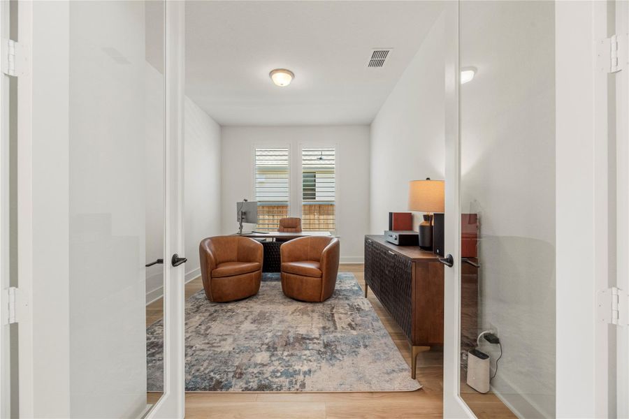 Furnished interior view inside a new home in Bridgeland, Cypress (Image 37).