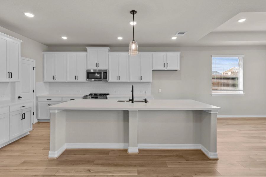 Kitchen. Sample product photo. Actual exterior and interior selections may vary by homesite. Photo may be virtually staged.