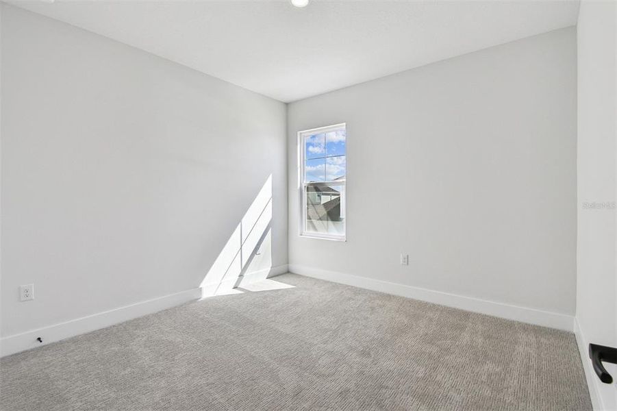 Spacious, unfurnished interior of a new home in Emerald Landing at Waterside at Lakewood Ranch – Cottage Series, Sarasota (Image 21).