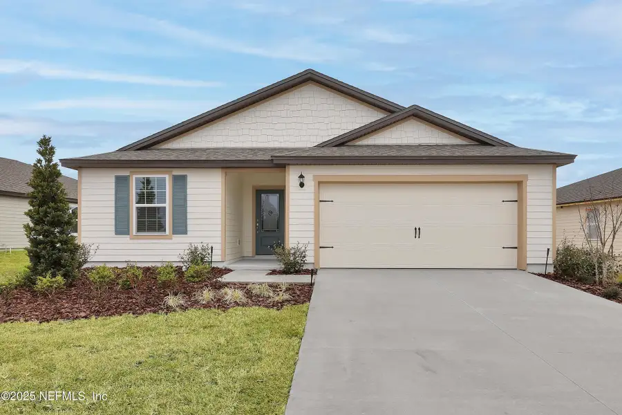 Front exterior of a new home in Rolling Hills, Green Cove Springs, FL, highlighting curb appeal (Image 2).