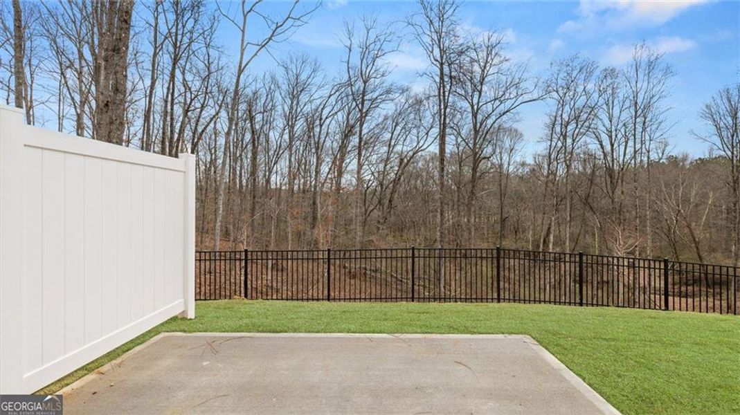 Exterior details and patio area of a home in Echo Glen, Stockbridge (Image 28).
