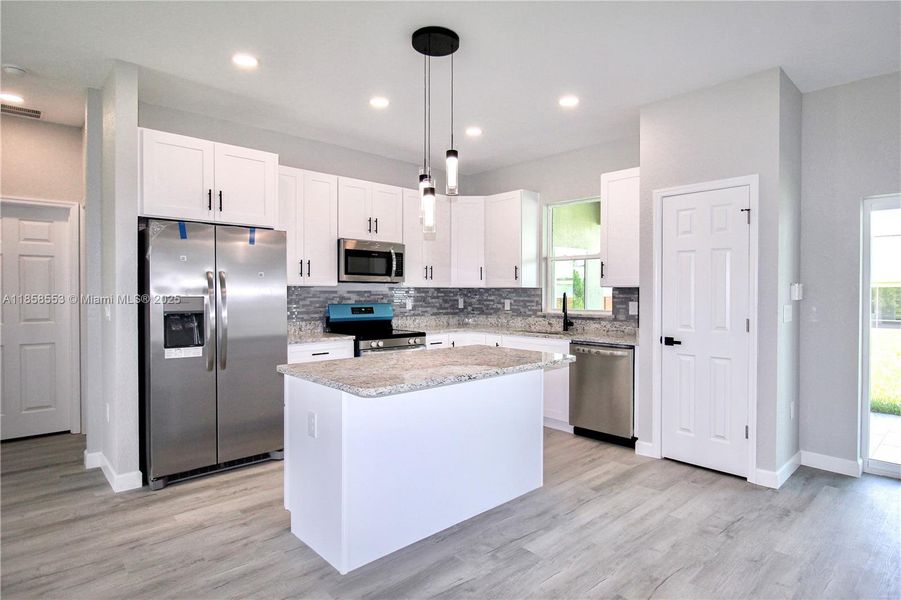 Furnished interior view inside a new home in , Sebring (Image 8). Furnished interior view inside a new home in , Sebring (Image 8).