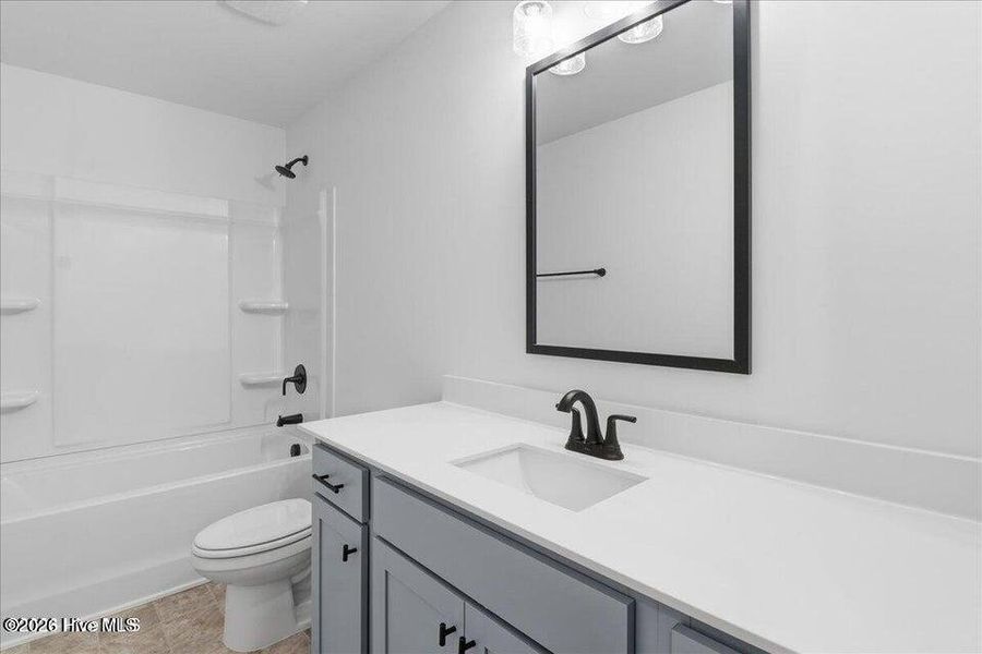 Furnished interior view inside a new home in Wood Creek Landing, Leland (Image 18).