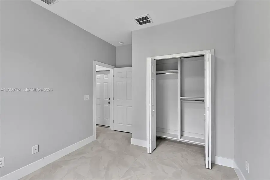 Spacious, unfurnished interior of a new home in , Lehigh Acres (Image 15). Spacious, unfurnished interior of a new home in , Lehigh Acres (Image 15).