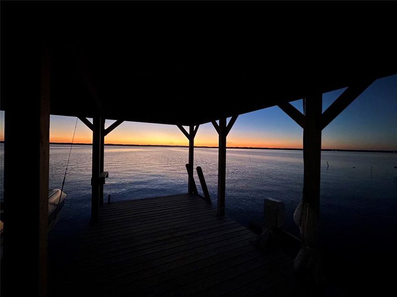 Dock with a water view and boat lift