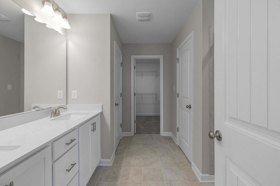 Representative furnished interior of a home built from the Magnolia by Caviness & Cates Communities in Bartlett Manor, Youngsville (Image 218).