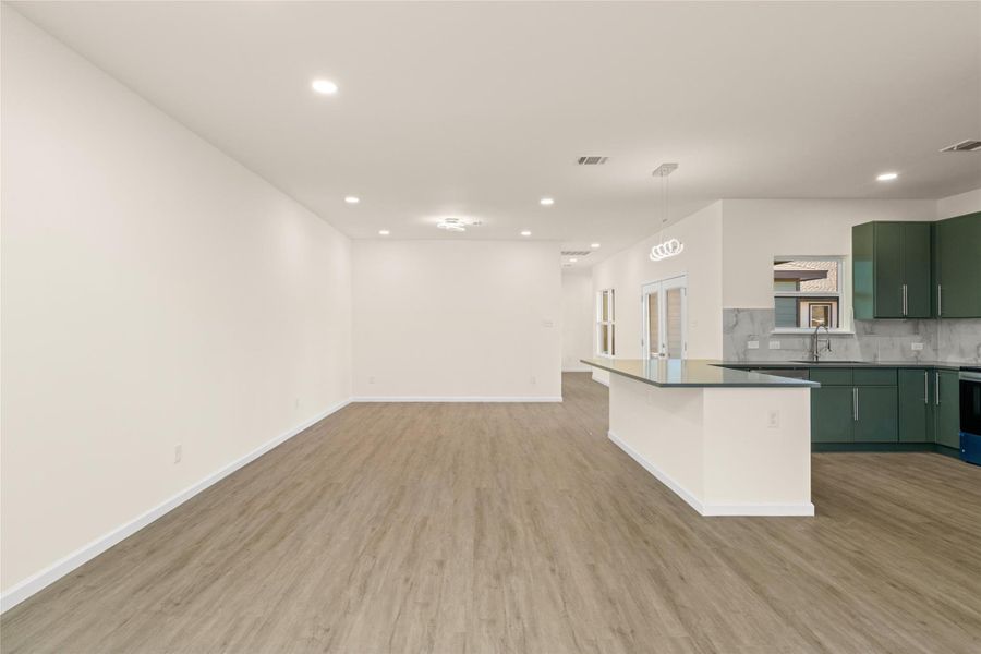 Open sightlines highlight the home’s thoughtful design and modern finishes.