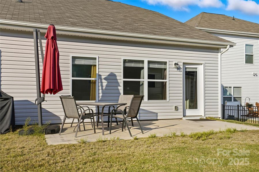 Exterior details and patio area of a home in Orchard Creek, Charlotte (Image 3).