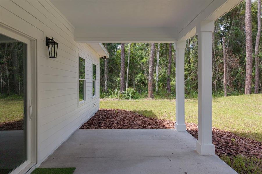 Exterior details and patio area of a home in , Micanopy (Image 16).