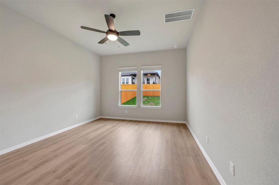 Spacious, unfurnished interior of a new home in Heritage, Dripping Springs (Image 22).