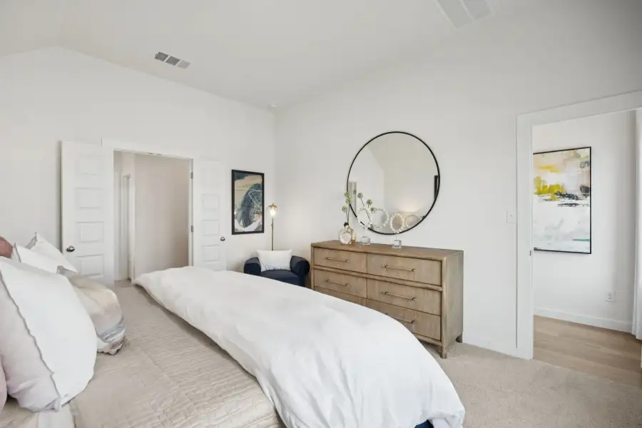 Primary Suite in the Diamond home plan by Trophy Signature Homes – REPRESENTATIVE PHOTO