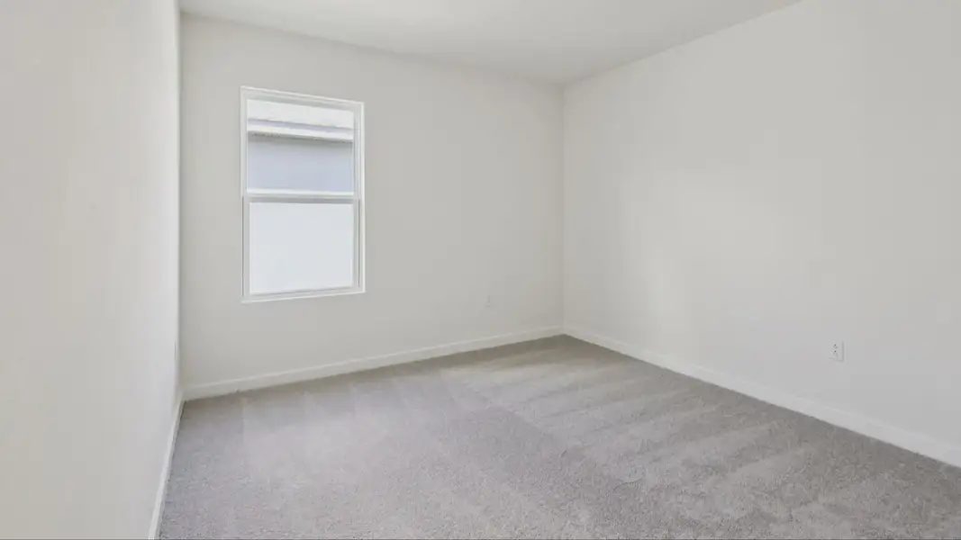 Bedroom in the Baker by DRB Homes in Willowbrook North