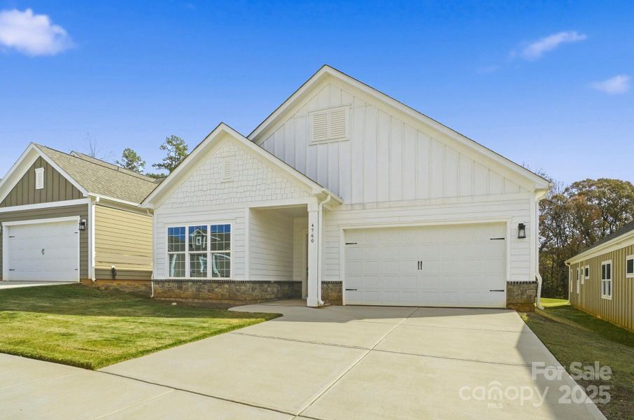 Front exterior of a new home in , Sherrills Ford, NC, highlighting curb appeal (Image 1).