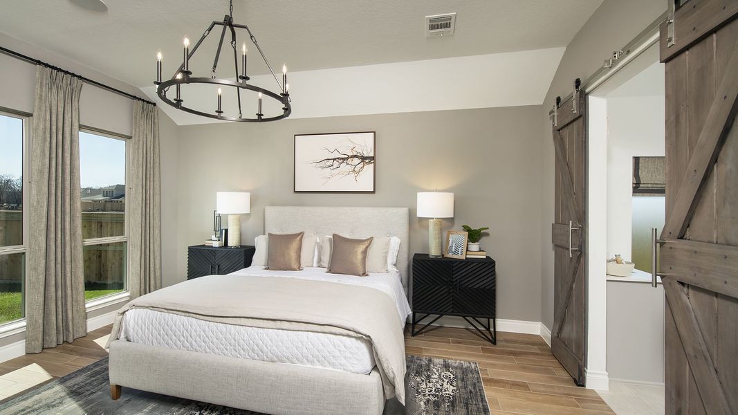 Representative furnished interior of a home built from the 2935M by Perry Homes in Lakes of Cane Island, Katy (Image 11).