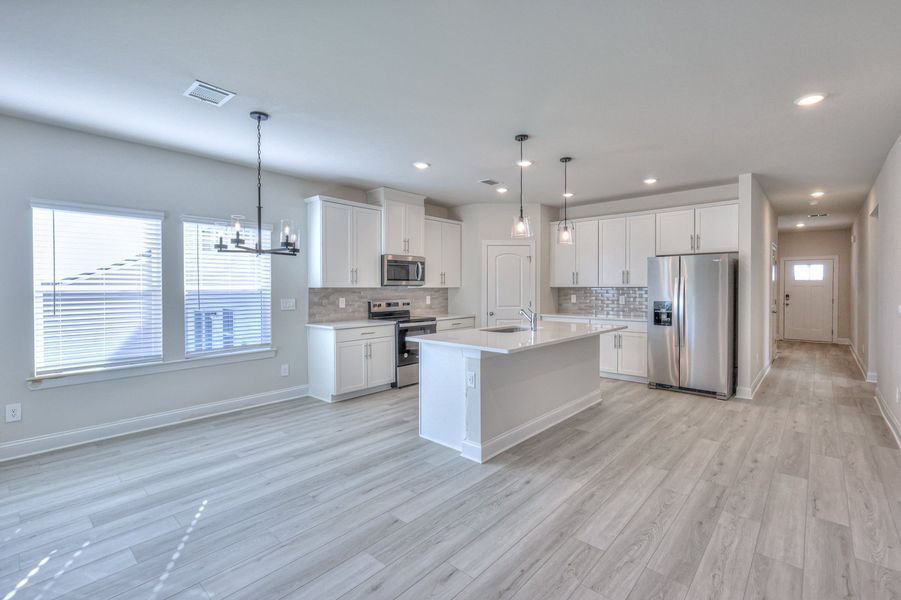 Spend family movie nights in the spacious great room.