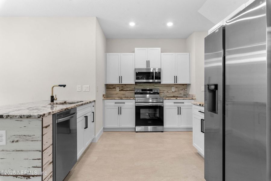 Furnished interior view inside a new home in , Jacksonville (Image 4). Furnished interior view inside a new home in , Jacksonville (Image 4).