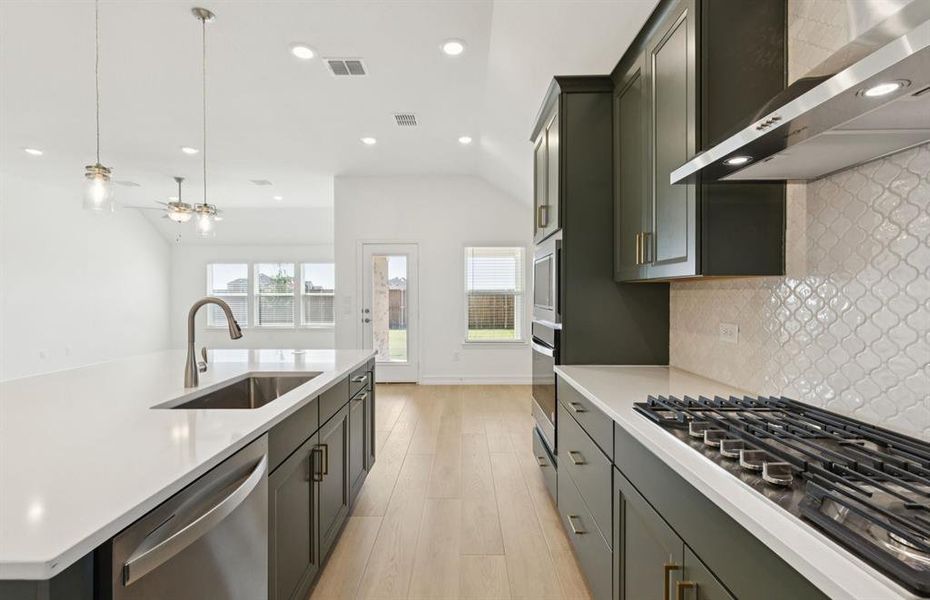 Spacious kitchen with eat-in bartop island Spacious kitchen with eat-in bartop island
