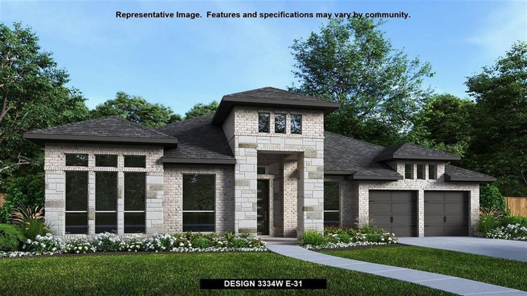 View of front of property with a front yard and a garage