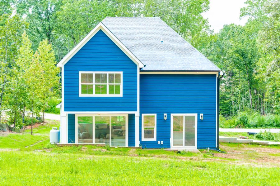 Front exterior of a new home in , Statesville, NC, highlighting curb appeal (Image 22).