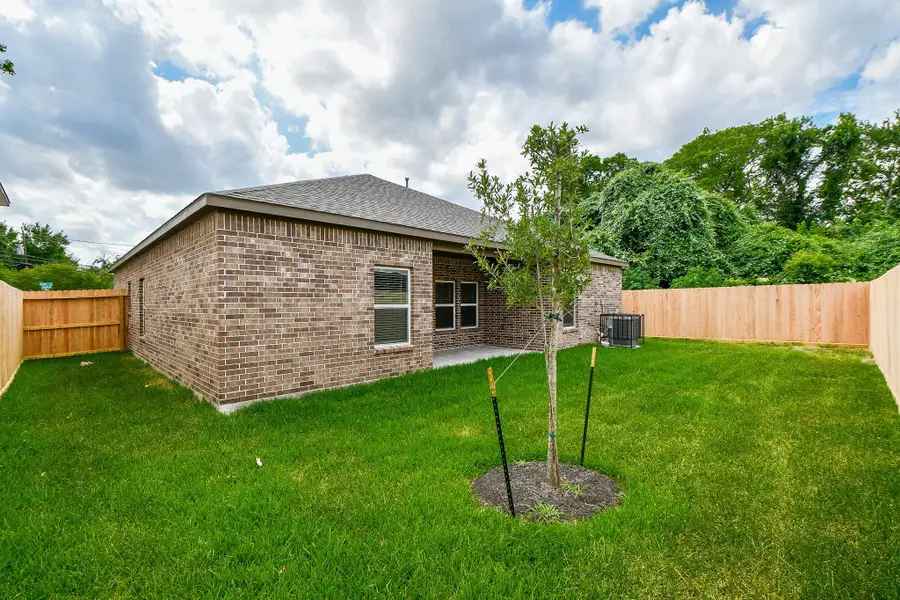 Exterior details and patio area of a home in , Houston (Image 3). Exterior details and patio area of a home in , Houston (Image 3).