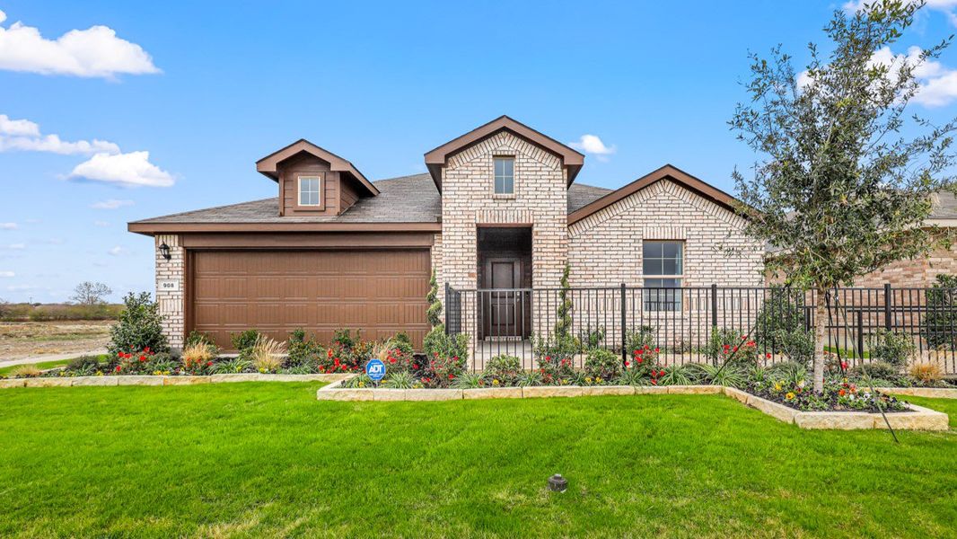 Representative exterior photo of a completed home built from the Justin by D.R. Horton in Lankford Farms, Cleburne, TX (Image 1). Representative exterior photo of a completed home built from the Justin by D.R. Horton in Lankford Farms, Cleburne, TX (Image 1).
