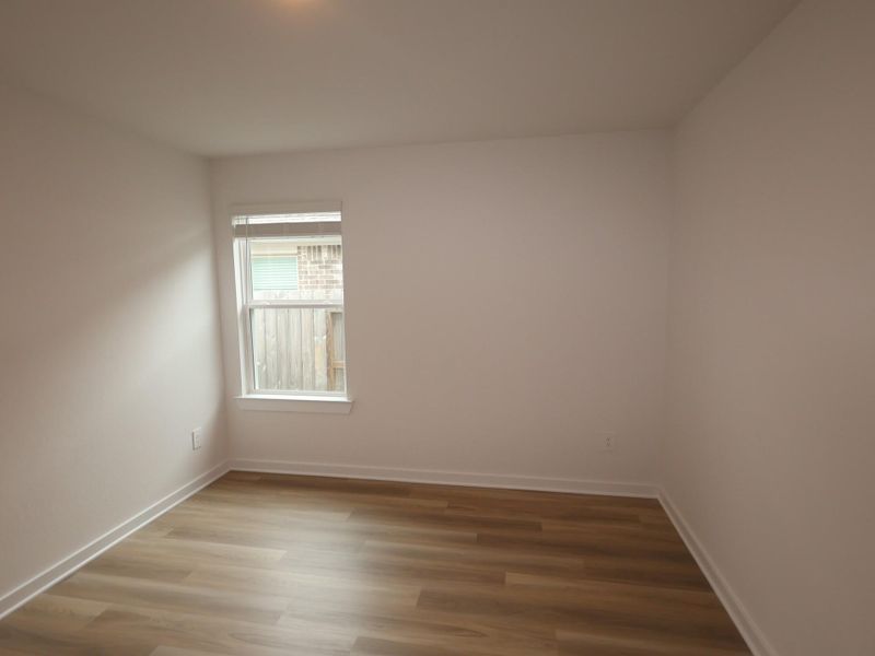 Spacious, unfurnished interior of a new home in Pinewood at Grand Texas, New Caney (Image 18).