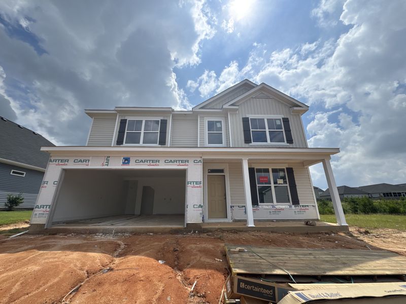 Front exterior of a new home in Windsor, North Augusta, SC, highlighting curb appeal (Image 2). Front exterior of a new home in Windsor, North Augusta, SC, highlighting curb appeal (Image 2).