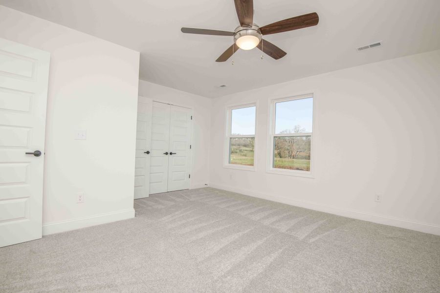 *Photo of example home. Selections and Finishes May Vary.*