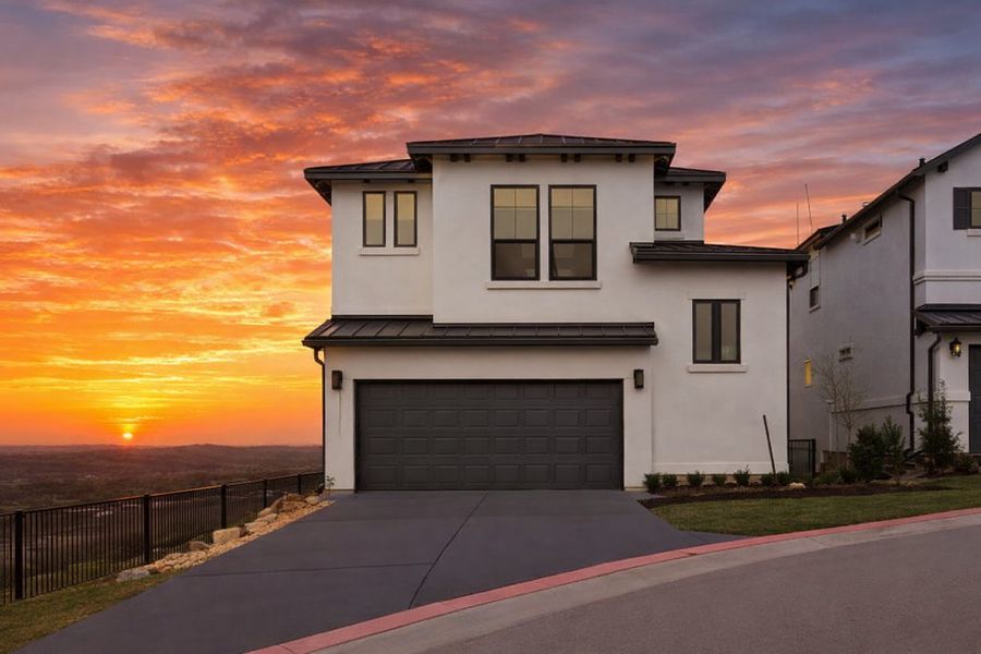 Front exterior of a new home in The Point at Rough Hollow, Lakeway, TX, highlighting curb appeal (Image 2). Front exterior of a new home in The Point at Rough Hollow, Lakeway, TX, highlighting curb appeal (Image 2).