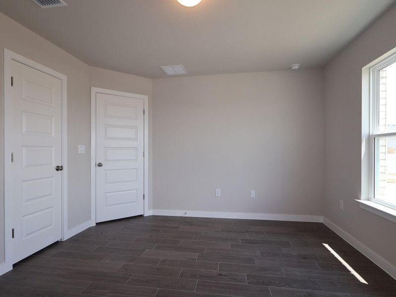Spacious, unfurnished interior of a new home in Willow Springs, Buda (Image 10). Spacious, unfurnished interior of a new home in Willow Springs, Buda (Image 10).