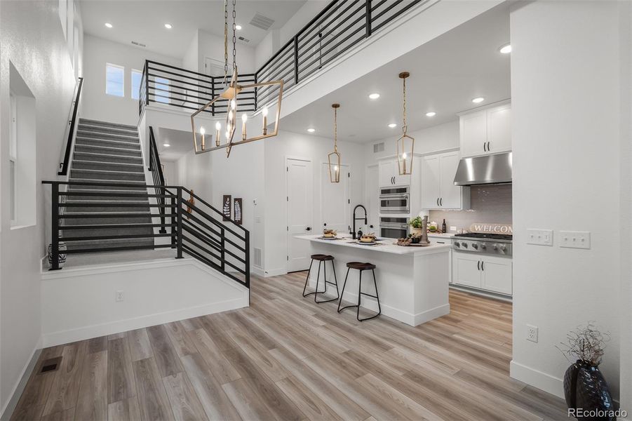 Furnished interior view inside a new home in Revel Crossing at Wolf Ranch - The Panorama Collection, Colorado Springs (Image 6).