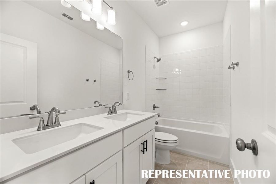 Guests will enjoy their own space in this lovely guest bath!  REPRESENTATIVE PHOTO