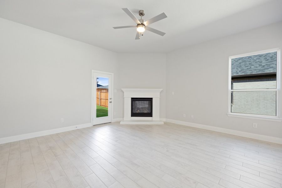 Representative unfurnished interior of a home built from the Waverly III by Megatel Homes in Bellagio, Forney (Image 10).