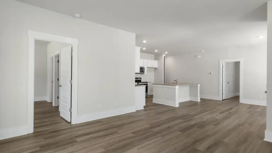 Spacious, unfurnished interior of a new home in The Retreat at Indigo Preserve Townhomes, Leland (Image 19).