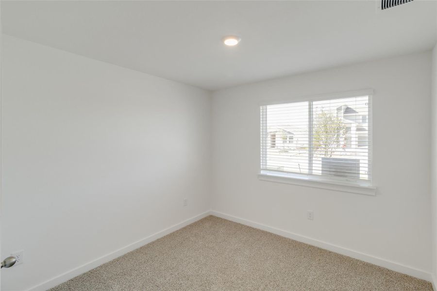 Spacious, unfurnished interior of a new home in Trails at Wildhorse, Austin (Image 15).