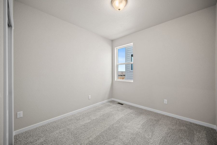 Spacious, unfurnished interior of a new home in Ridge at Lorson Ranch, Colorado Springs (Image 30).